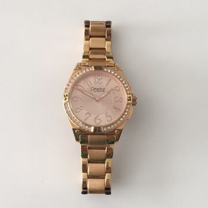 Carvelle by Bulova rose gold watch w/ rhinestones